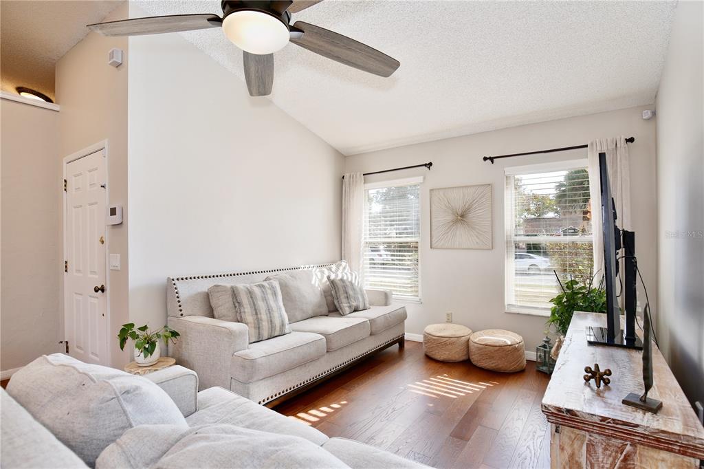 300 Springview Drive Sanford, FL 32773 - Photo 7 of 55 a living room with furniture and window