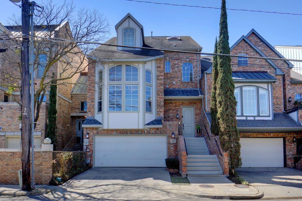 935 Liberty Street Dallas, TX 75204 - Photo 1 of 1 a front view of a house with a fountain
