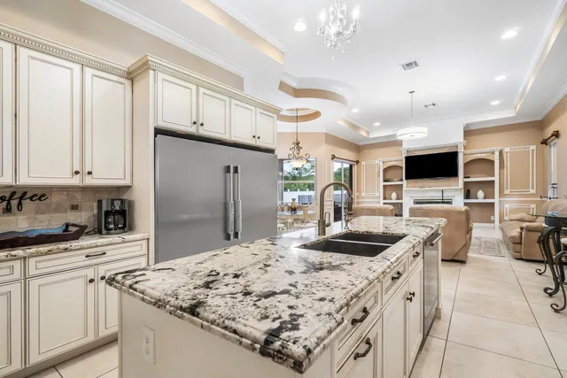 a view of a livingroom with furniture window and wooden floor