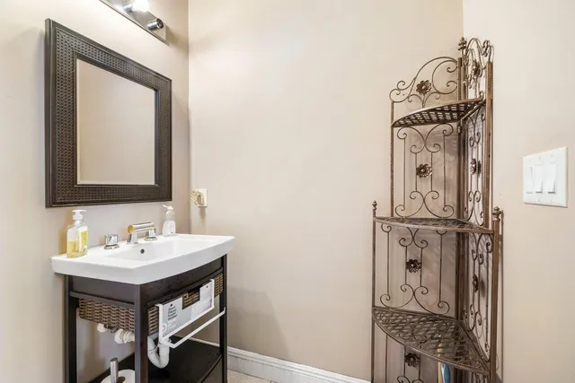 a spacious bedroom with a bed and a window