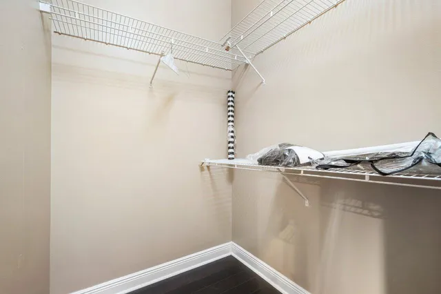 a view of a room with racks on the wall