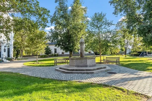 a view of a swimming pool with a yard