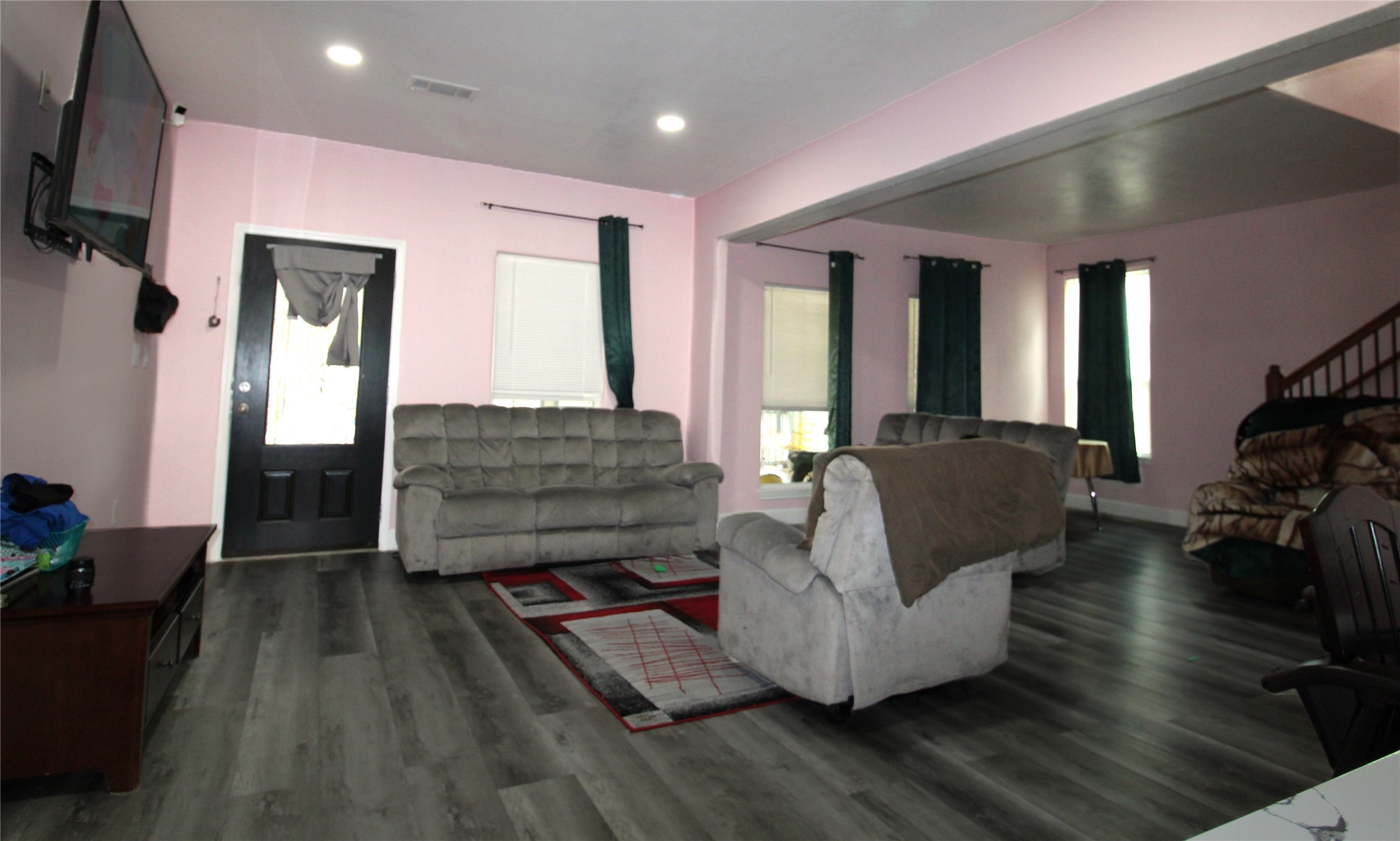 820 Railroad Avenue Shepherd, TX 77371 - Photo 11 of 29 a living room with furniture and a flat screen tv