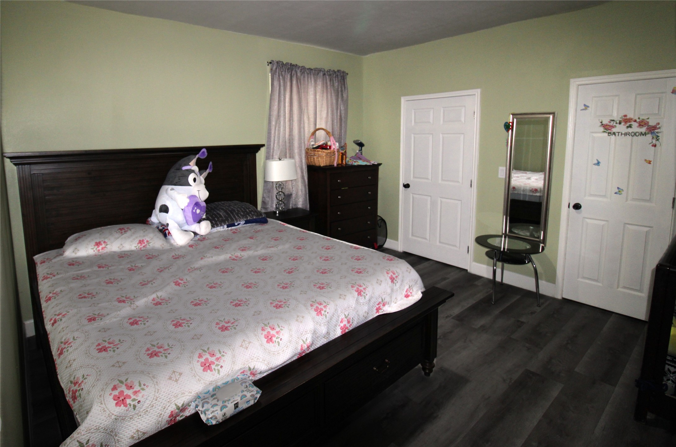 820 Railroad Avenue Shepherd, TX 77371 - Photo 12 of 29 a bedroom with a bed and a window