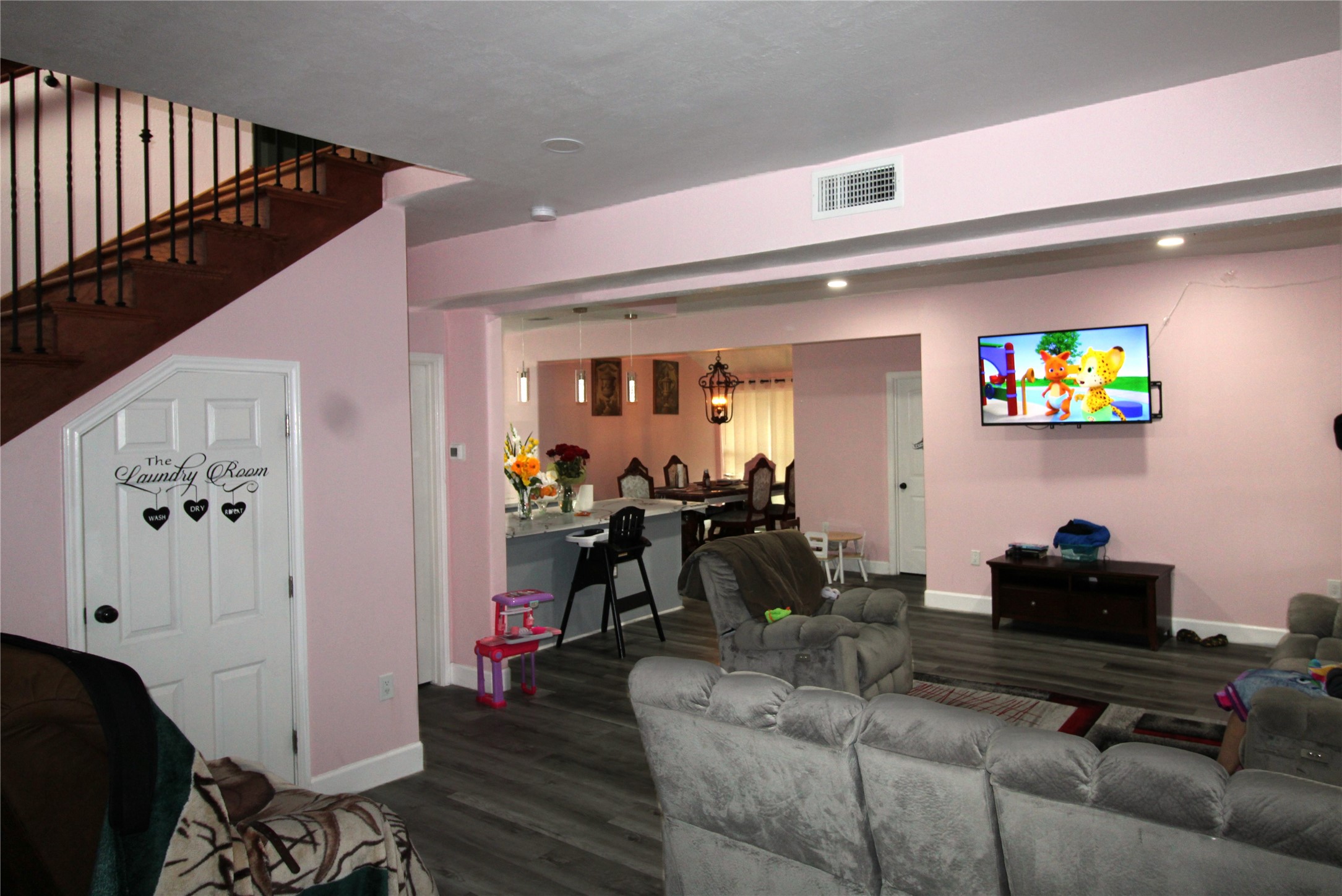 820 Railroad Avenue Shepherd, TX 77371 - Photo 22 of 29 a living room with furniture and a flat screen tv