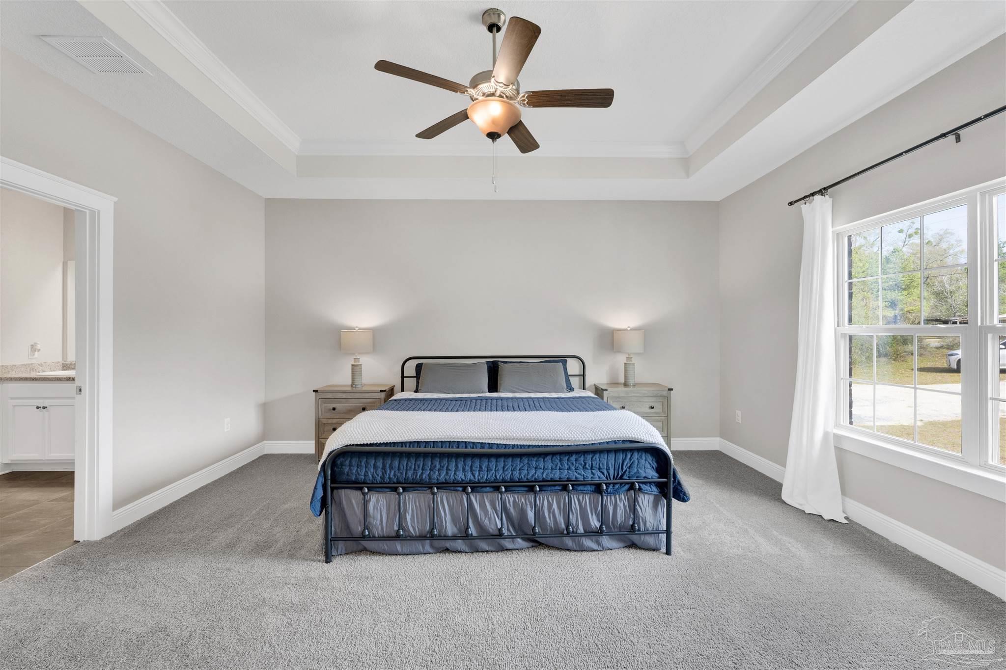 4363 Morristown Road Jay, FL 32565 - Photo 14 of 37 a bedroom with a bed and window