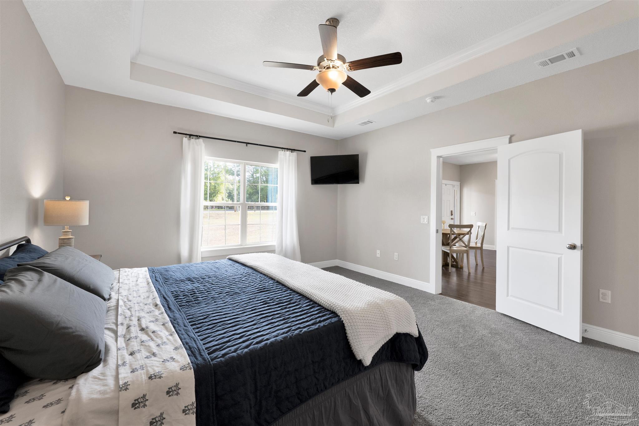 4363 Morristown Road Jay, FL 32565 - Photo 15 of 37 a bedroom with a bed and a window