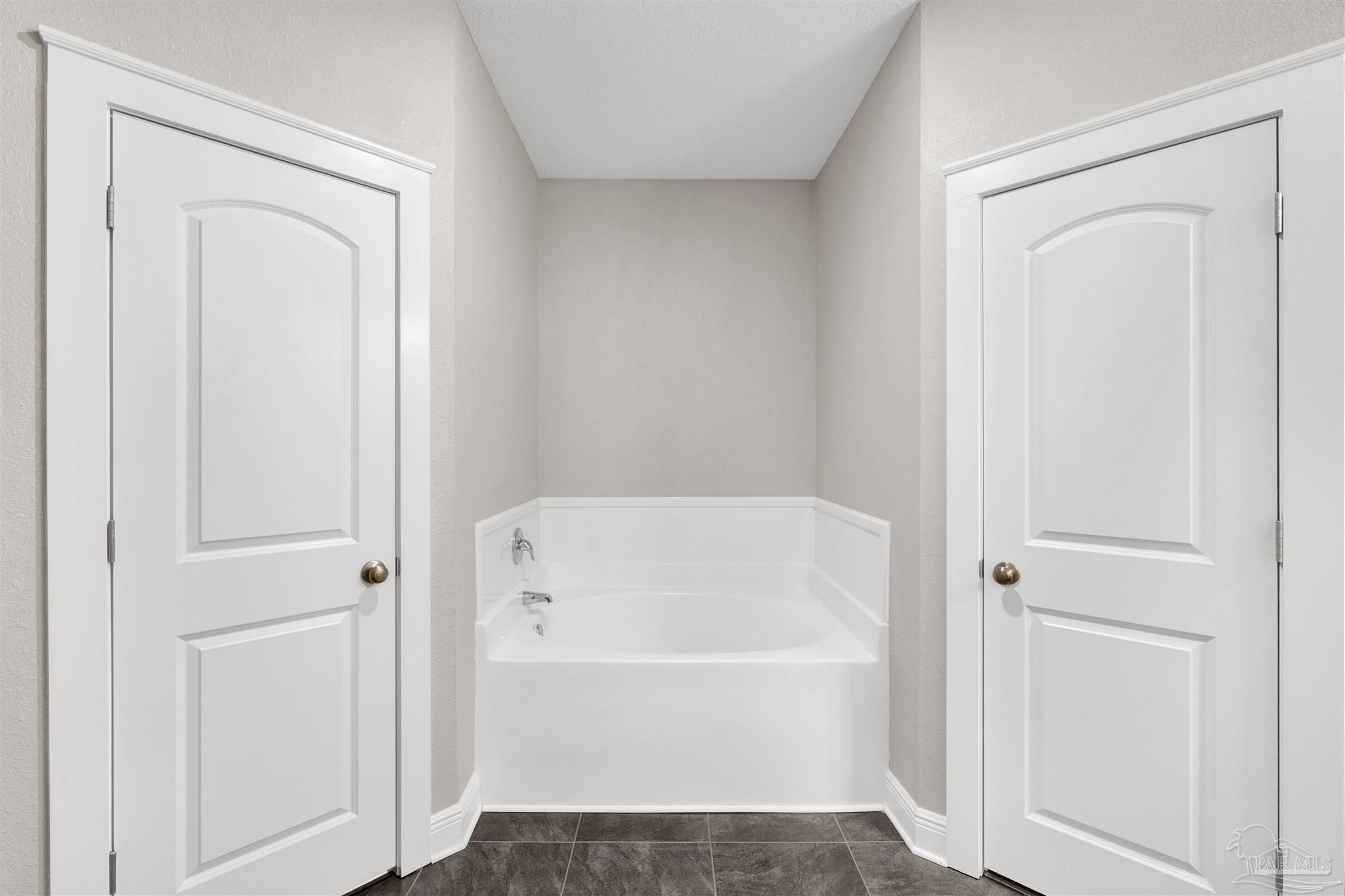 4363 Morristown Road Jay, FL 32565 - Photo 19 of 37 a white bath tub sitting next to a shower