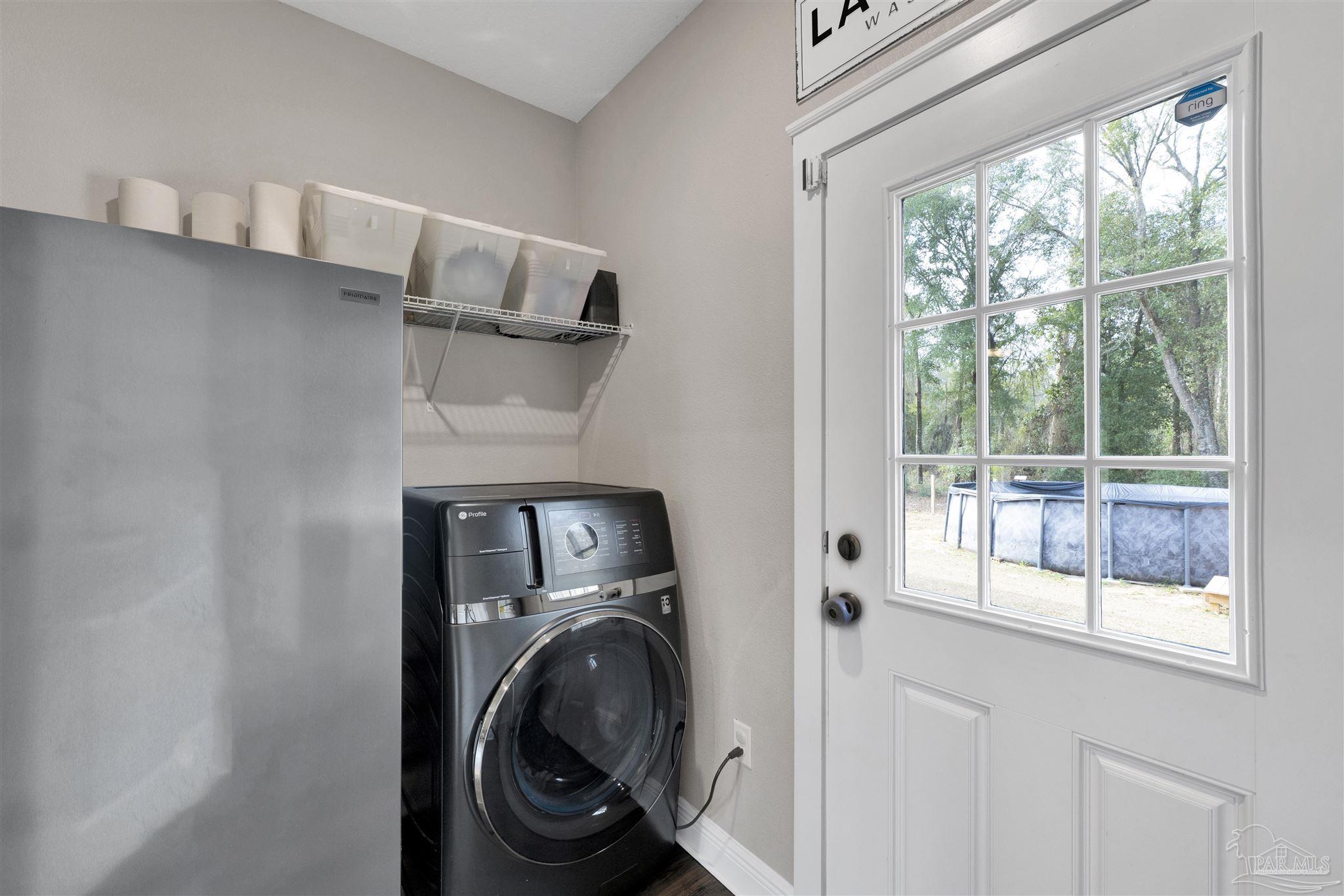4363 Morristown Road Jay, FL 32565 - Photo 27 of 37 a utility room with dryer and washer