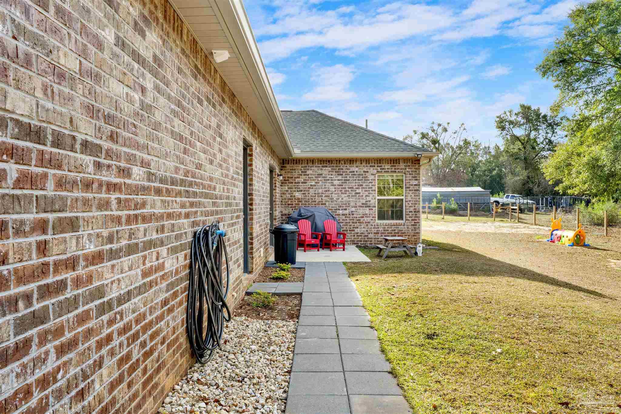 4363 Morristown Road Jay, FL 32565 - Photo 29 of 37 a view of swimming pool with an outdoor seating