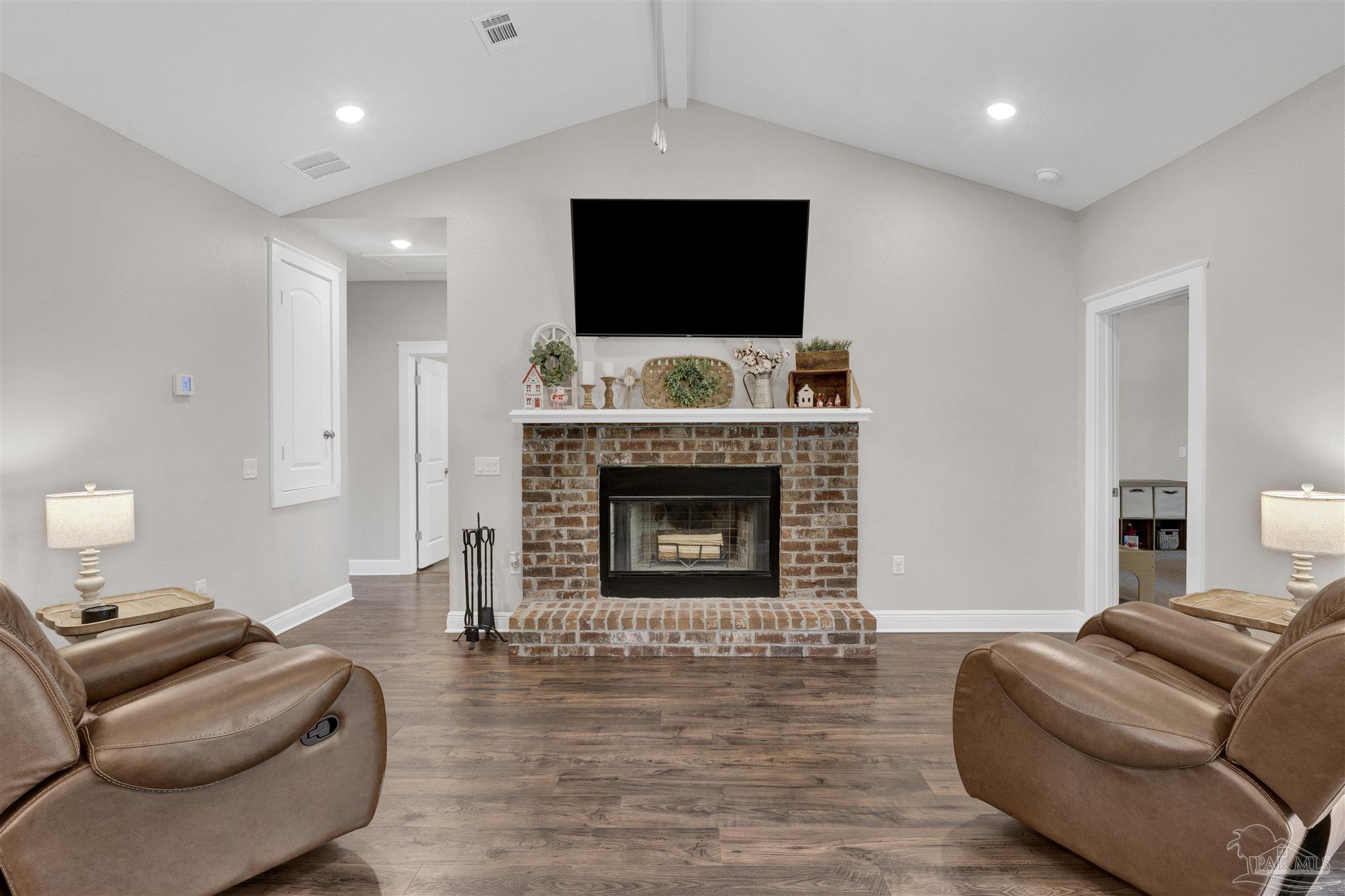 4363 Morristown Road Jay, FL 32565 - Photo 3 of 37 a living room with furniture and a fireplace