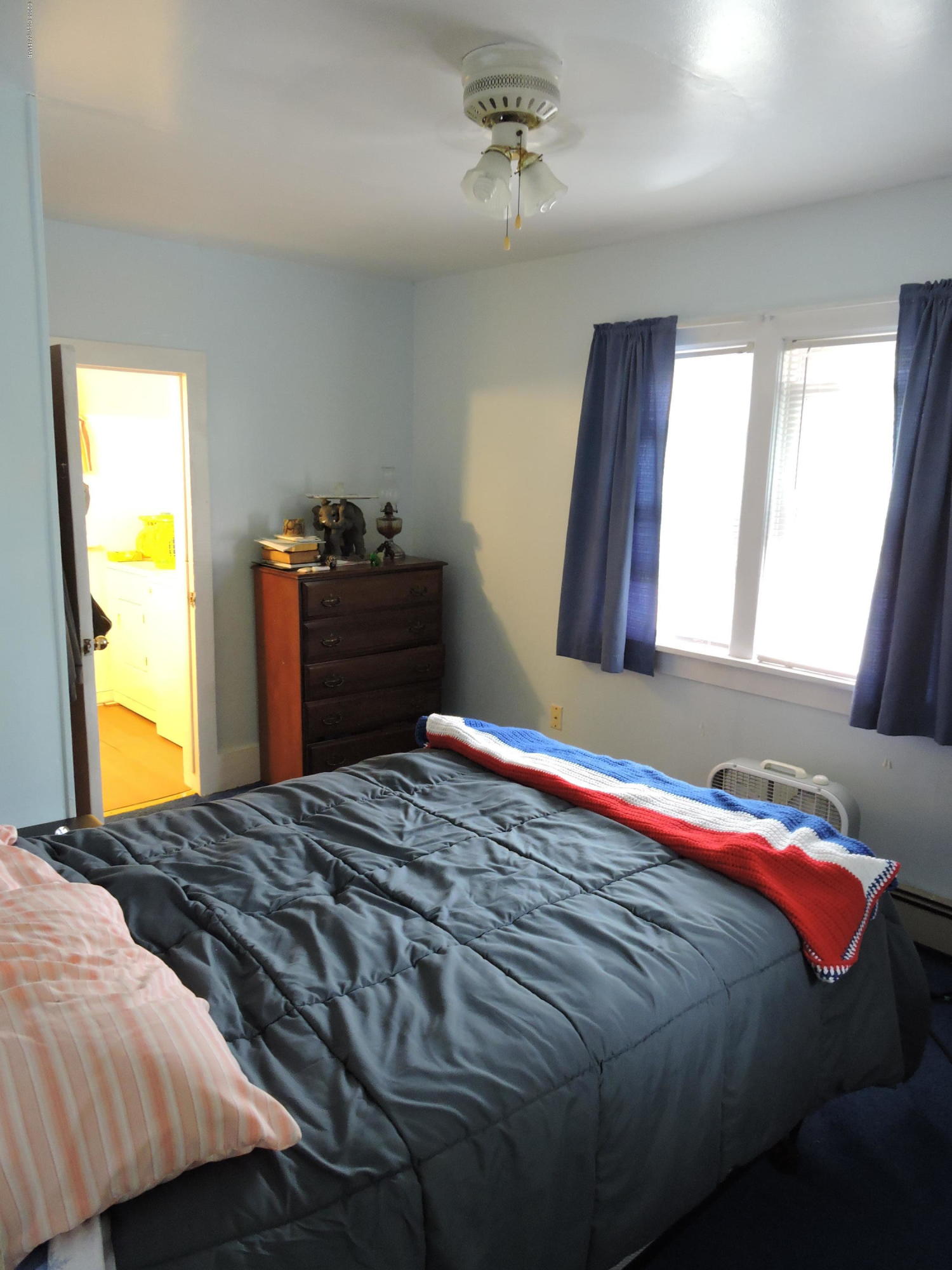 813 Stokes Mill Road Stroudsburg, PA 18360 - Photo 14 of 20 a bedroom with a bed and a window