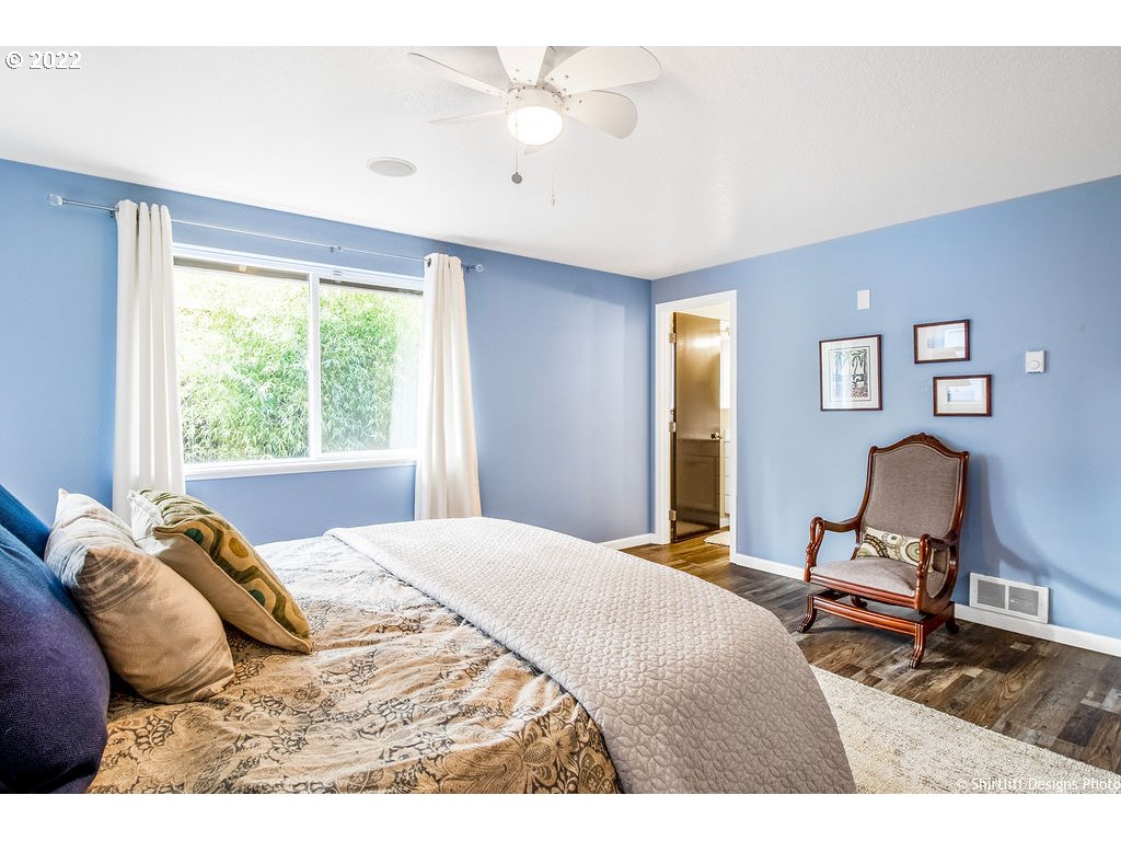 3565 Castrey Street Eugene, OR 97404 - Photo 17 of 30 a bedroom with a bed and window