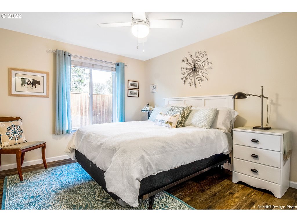3565 Castrey Street Eugene, OR 97404 - Photo 20 of 30 a bedroom with a bed and a window