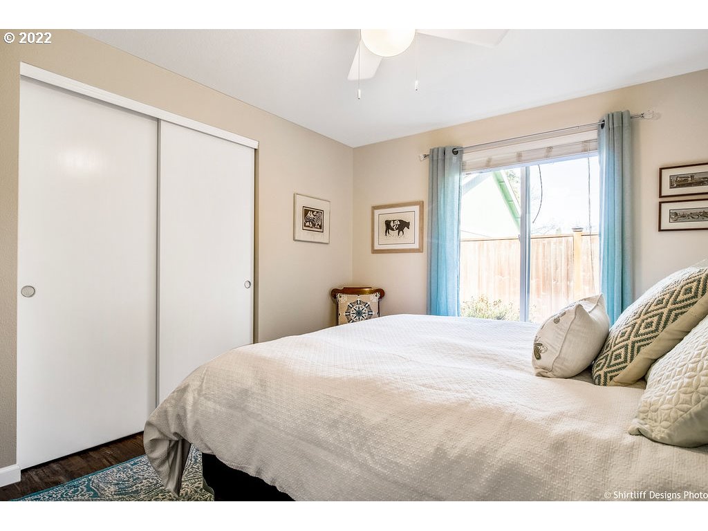 3565 Castrey Street Eugene, OR 97404 - Photo 21 of 30 a bedroom with a bed and a window