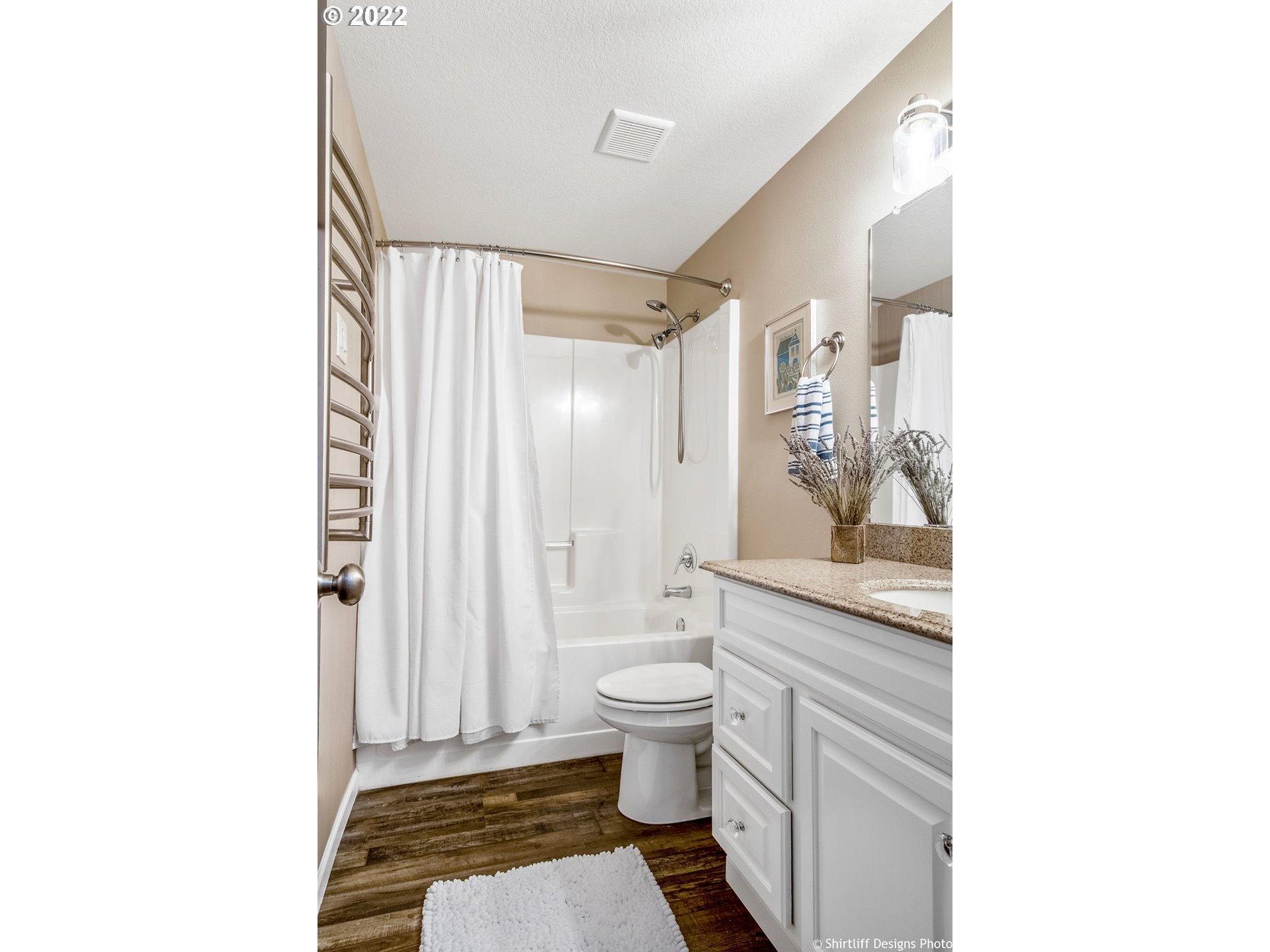 3565 Castrey Street Eugene, OR 97404 - Photo 24 of 30 a bathroom with a granite countertop sink toilet and shower
