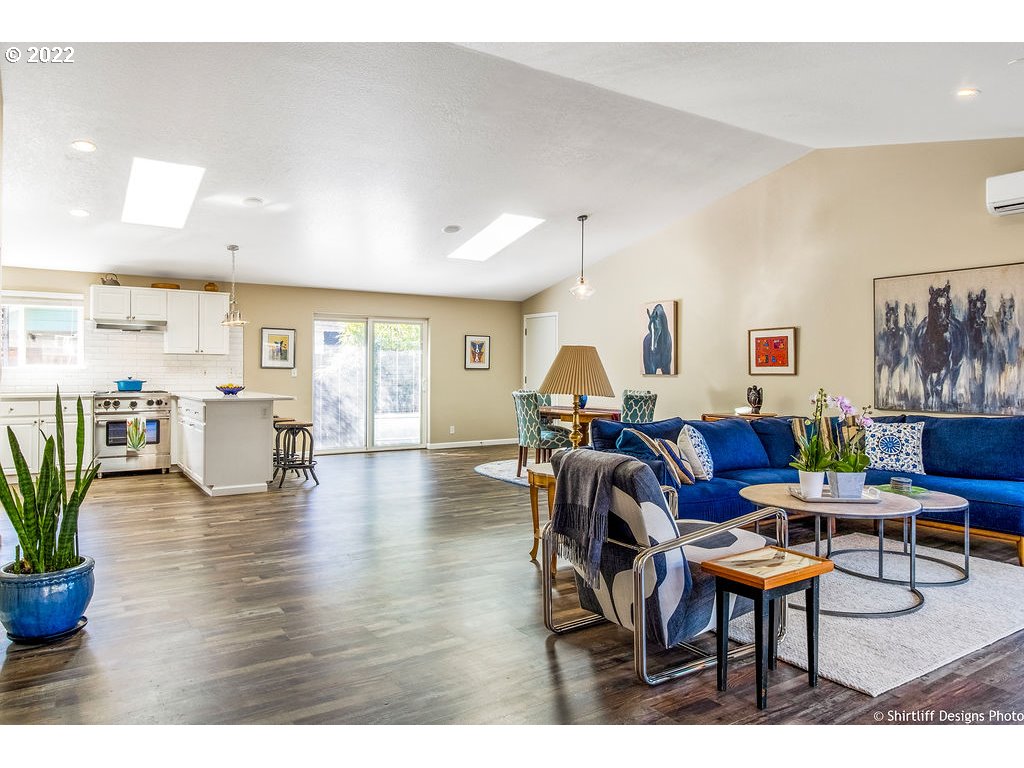 3565 Castrey Street Eugene, OR 97404 - Photo 4 of 30 a living room with furniture and wooden floor