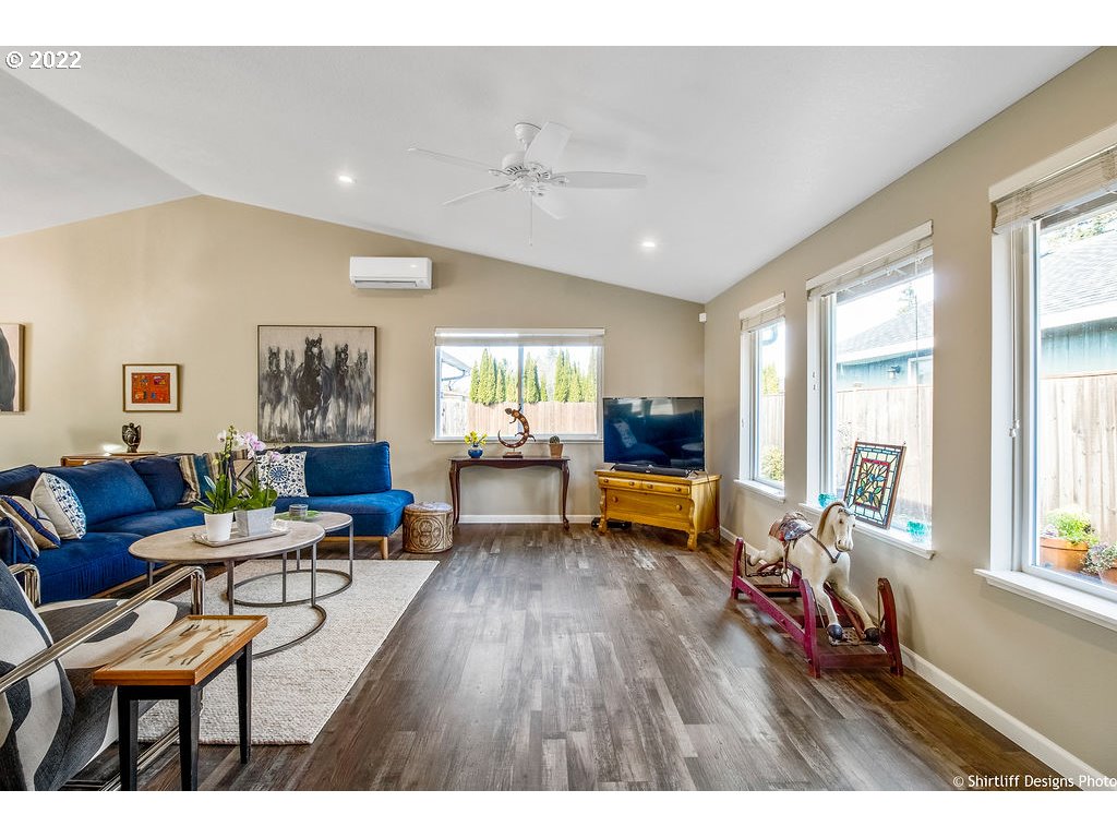 3565 Castrey Street Eugene, OR 97404 - Photo 5 of 30 a living room with furniture and a wooden floor