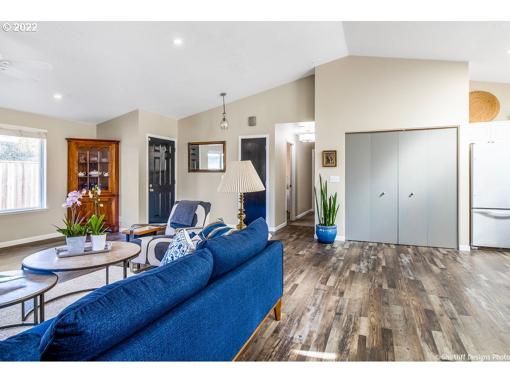 3565 Castrey Street Eugene, OR 97404 - Photo 7 of 30 a living room with furniture and a wooden floor