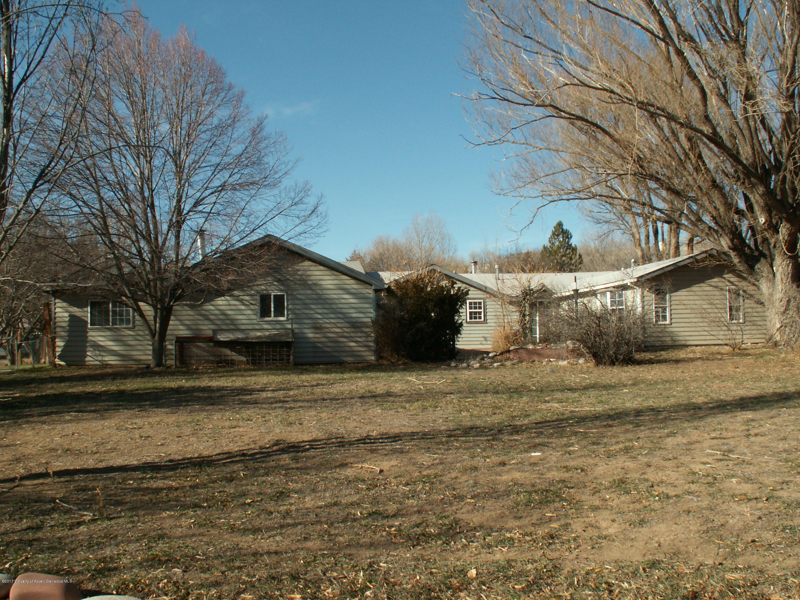 826 Randolph Avenue Rifle, CO 81650 - Photo 2 of 21 a view of a house with a snow