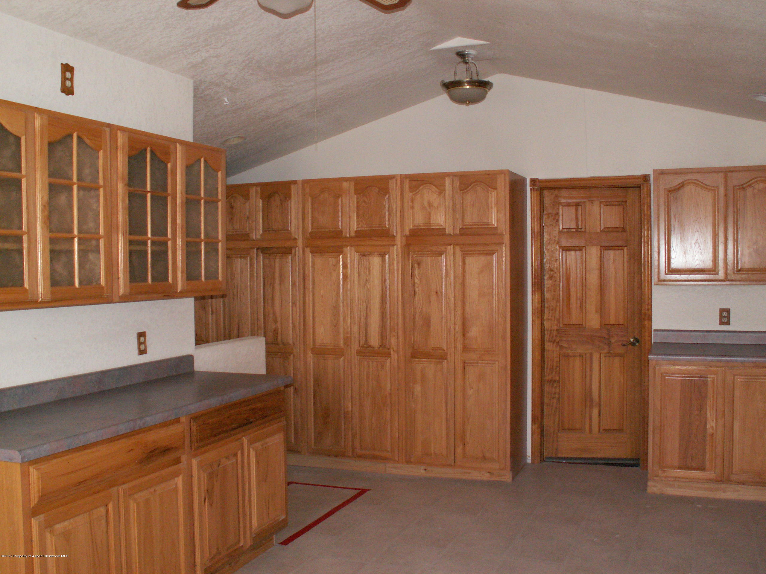 826 Randolph Avenue Rifle, CO 81650 - Photo 7 of 21 a bathroom with a sink and a mirror