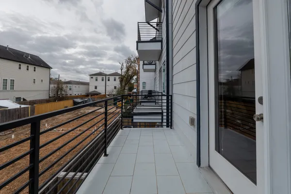a view of a backyard with furniture