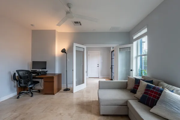 a living room with furniture and a window