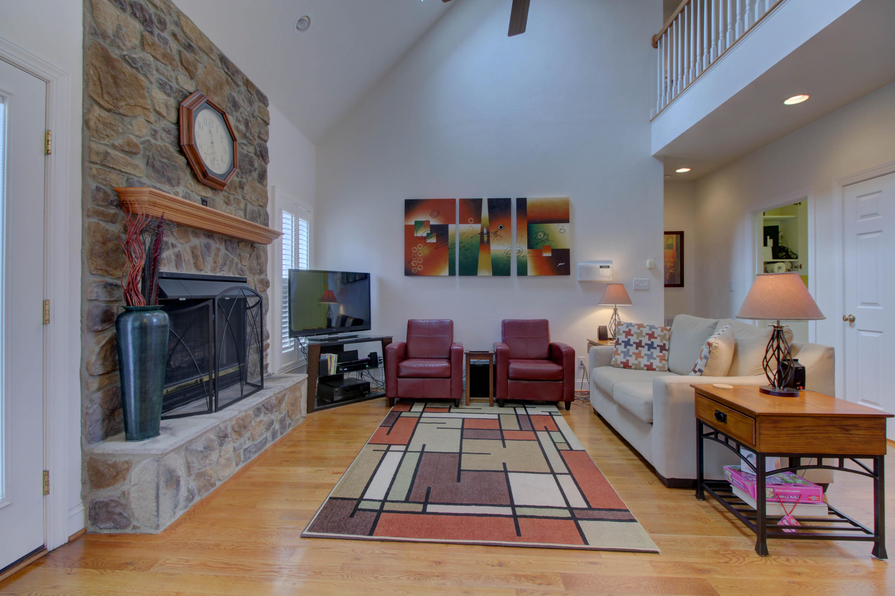 80 Cobblestone Drive Blue Ridge, VA 24064 - Photo 17 of 59 a living room with furniture a flat screen tv and a fireplace