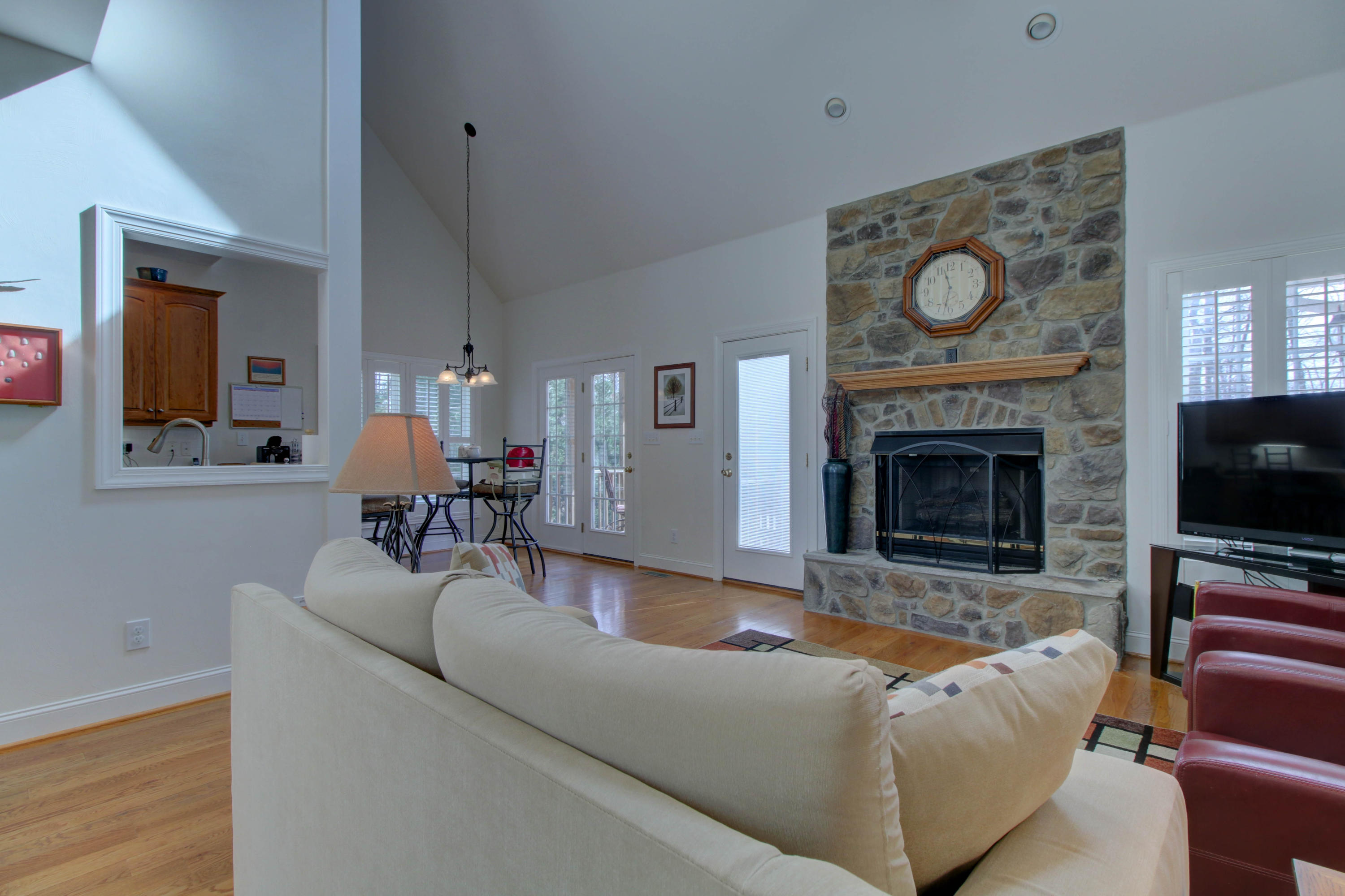 80 Cobblestone Drive Blue Ridge, VA 24064 - Photo 22 of 59 a living room with furniture a flat screen tv and a fireplace