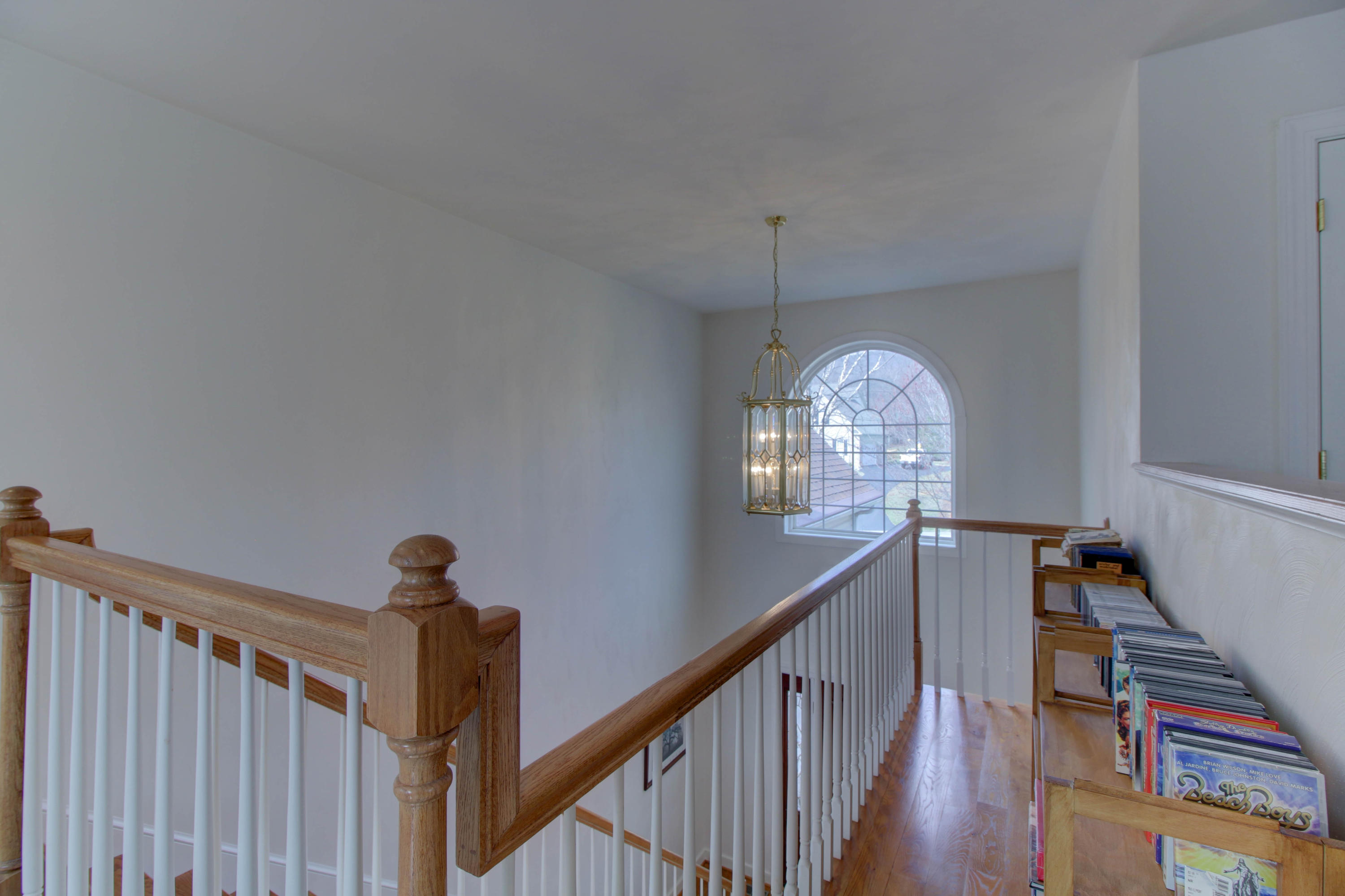 80 Cobblestone Drive Blue Ridge, VA 24064 - Photo 33 of 59 a view of a hallway with wooden floor and staircase
