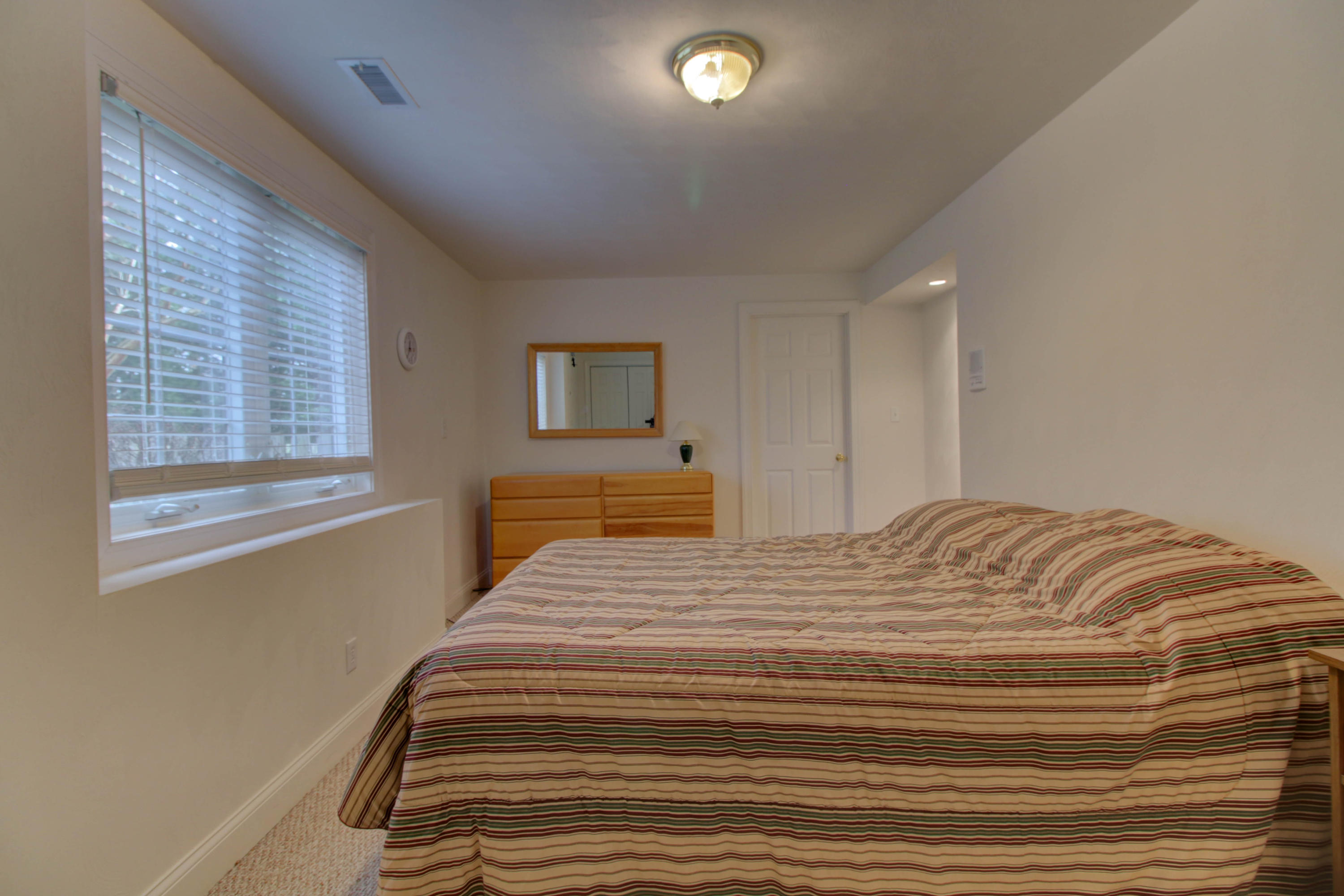 80 Cobblestone Drive Blue Ridge, VA 24064 - Photo 40 of 59 a bedroom with a bed and a window