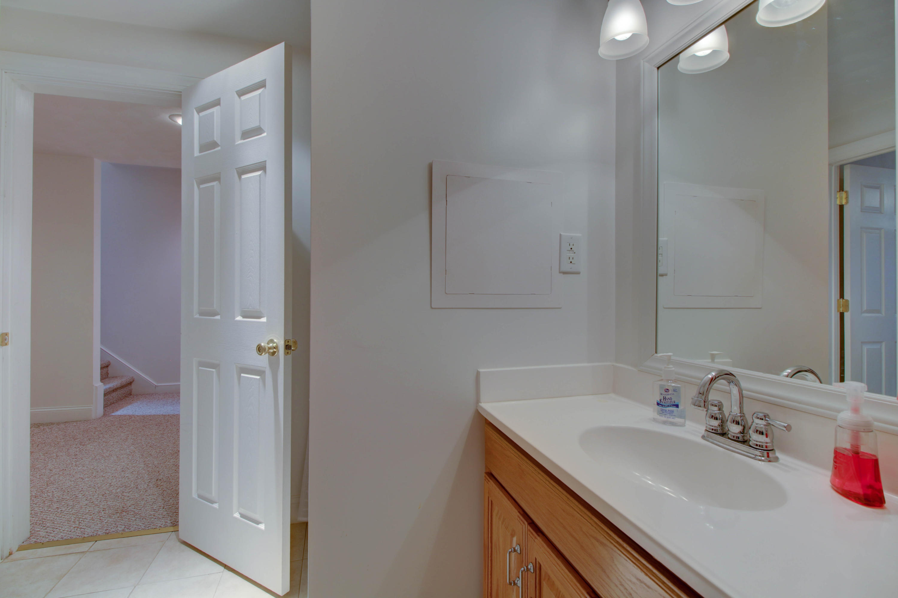 80 Cobblestone Drive Blue Ridge, VA 24064 - Photo 42 of 59 a bathroom with a granite countertop sink and a mirror