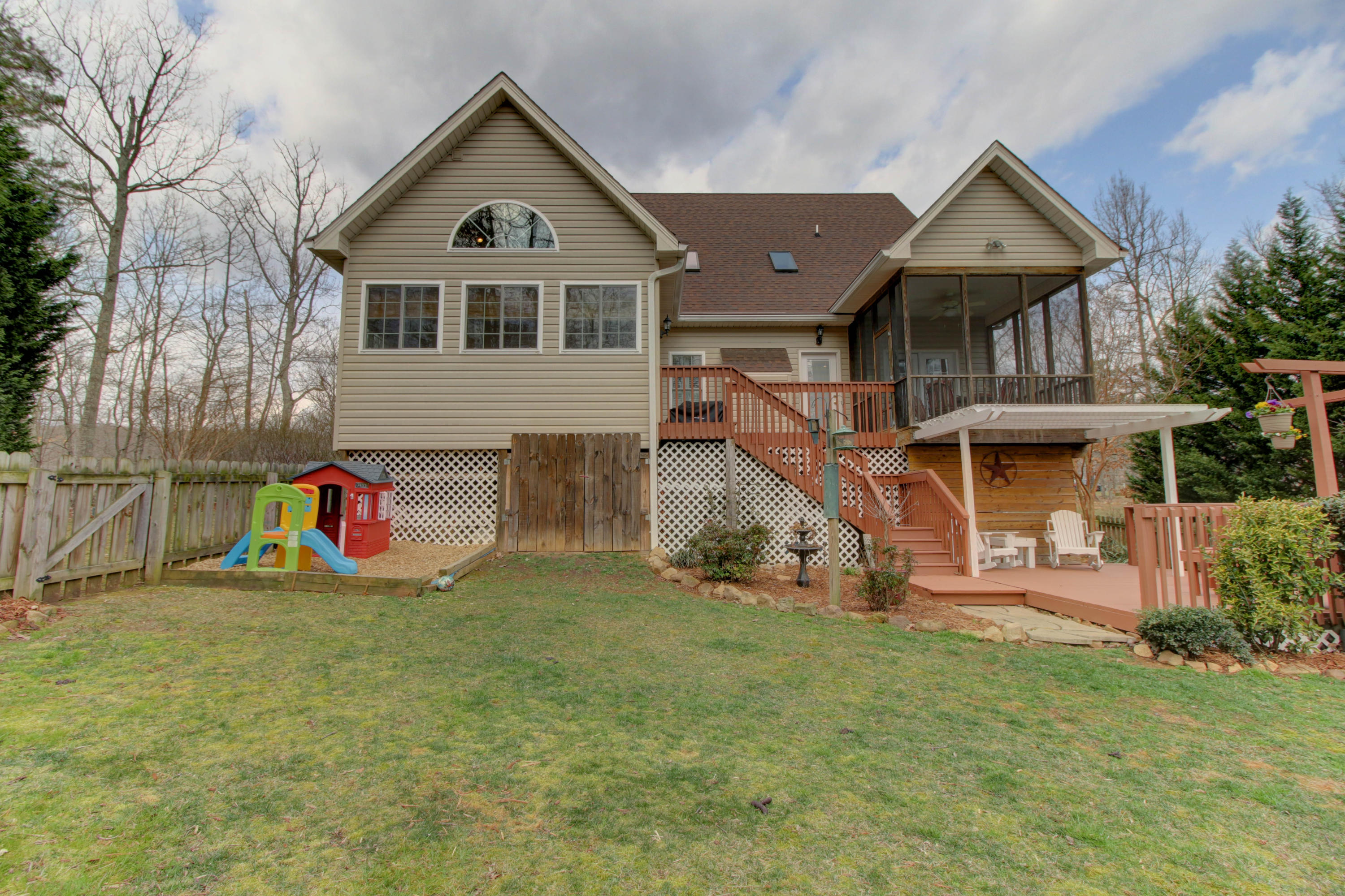80 Cobblestone Drive Blue Ridge, VA 24064 - Photo 53 of 59 a view of a house with a big yard and large trees