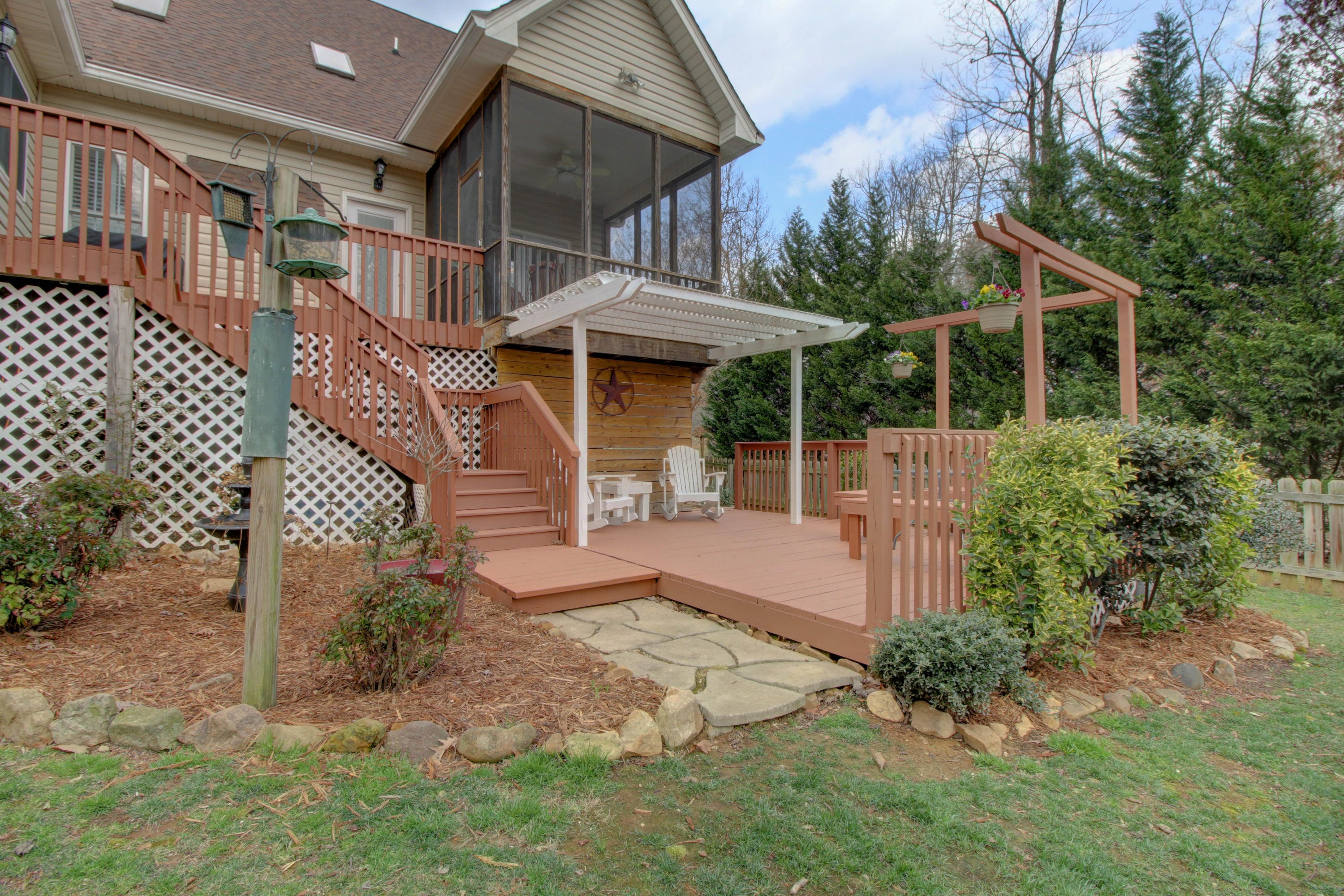 80 Cobblestone Drive Blue Ridge, VA 24064 - Photo 54 of 59 a view of a house with a yard and potted plants