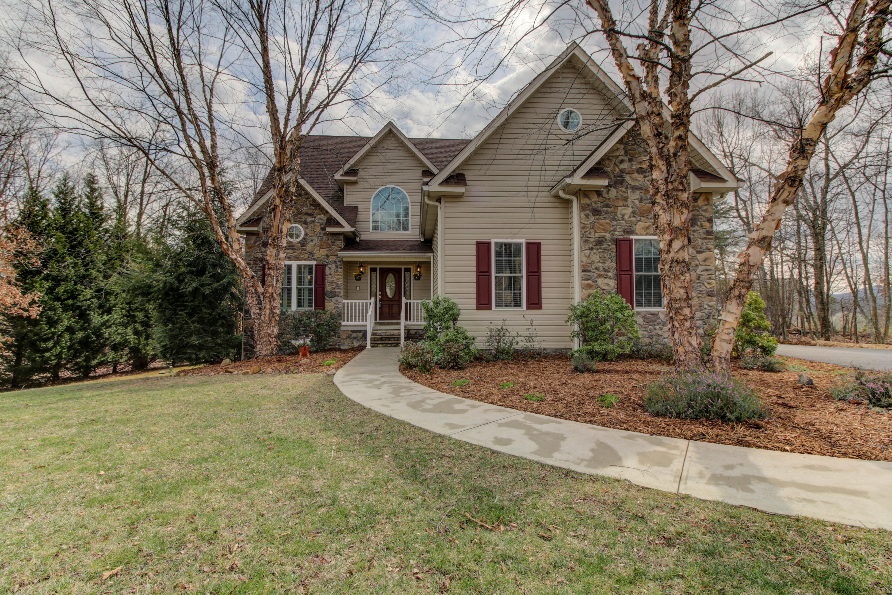 80 Cobblestone Drive Blue Ridge, VA 24064 - Photo 56 of 59 a front view of a house with yard and trees