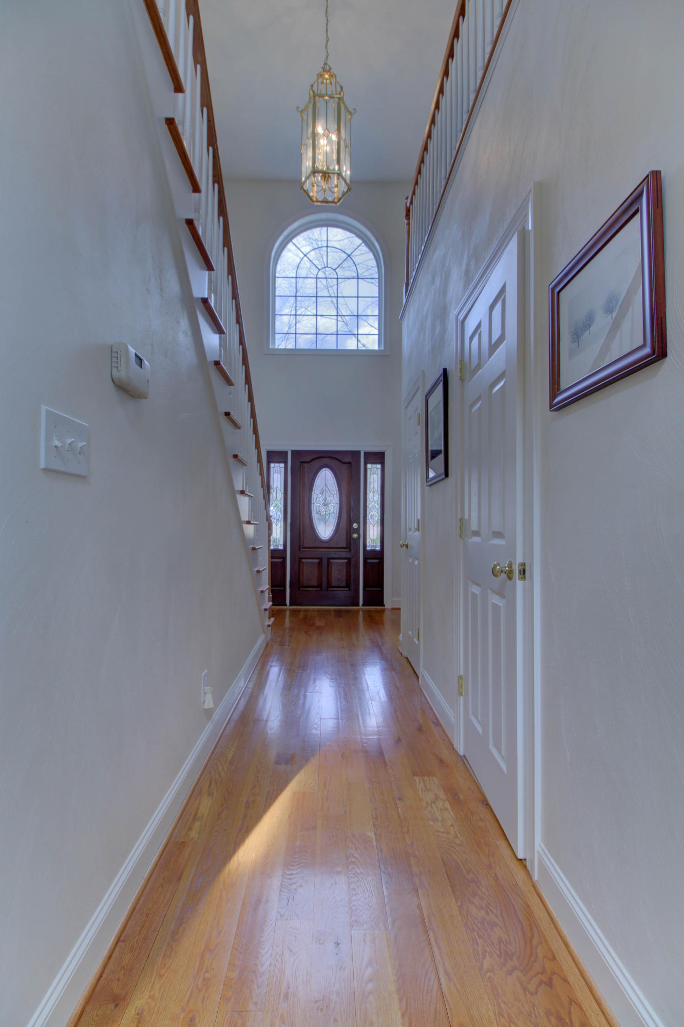 80 Cobblestone Drive Blue Ridge, VA 24064 - Photo 8 of 59 wooden floor in a hall with an entryway