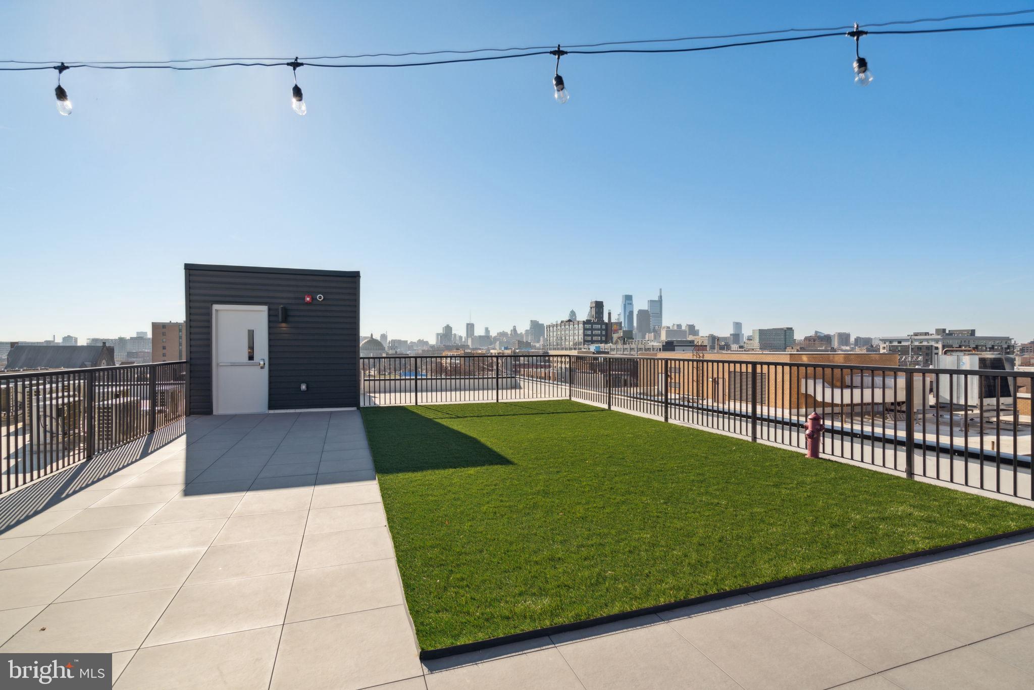 720 West Thompson Street, Unit 2B316 Philadelphia, PA 19122 - Photo 30 of 32 a view of a swimming pool with a yard