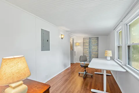 a workspace with wooden floor