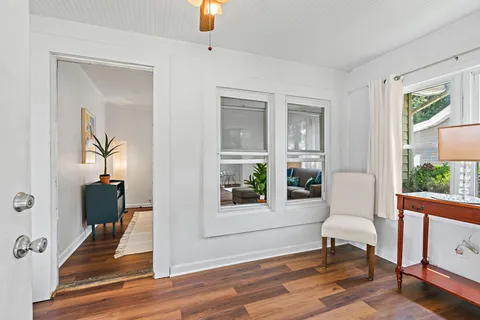 a living room with furniture and a window