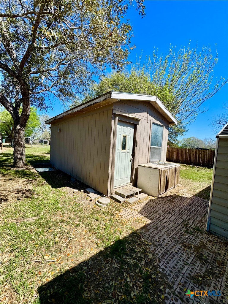 4904 Lone Tree Road Victoria, TX 77901 - Photo 10 of 13 a view of a house with a yard