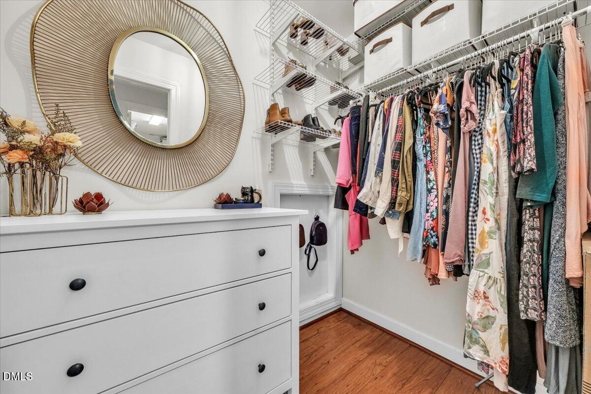 2908 Oak Bridge Drive Raleigh, NC 27610 - Photo 27 of 47 a view of walk in closet with clothes and shoes
