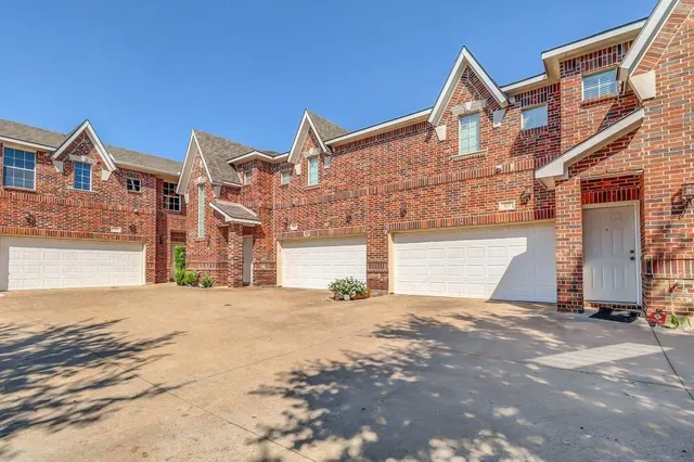 a view of a house with a street