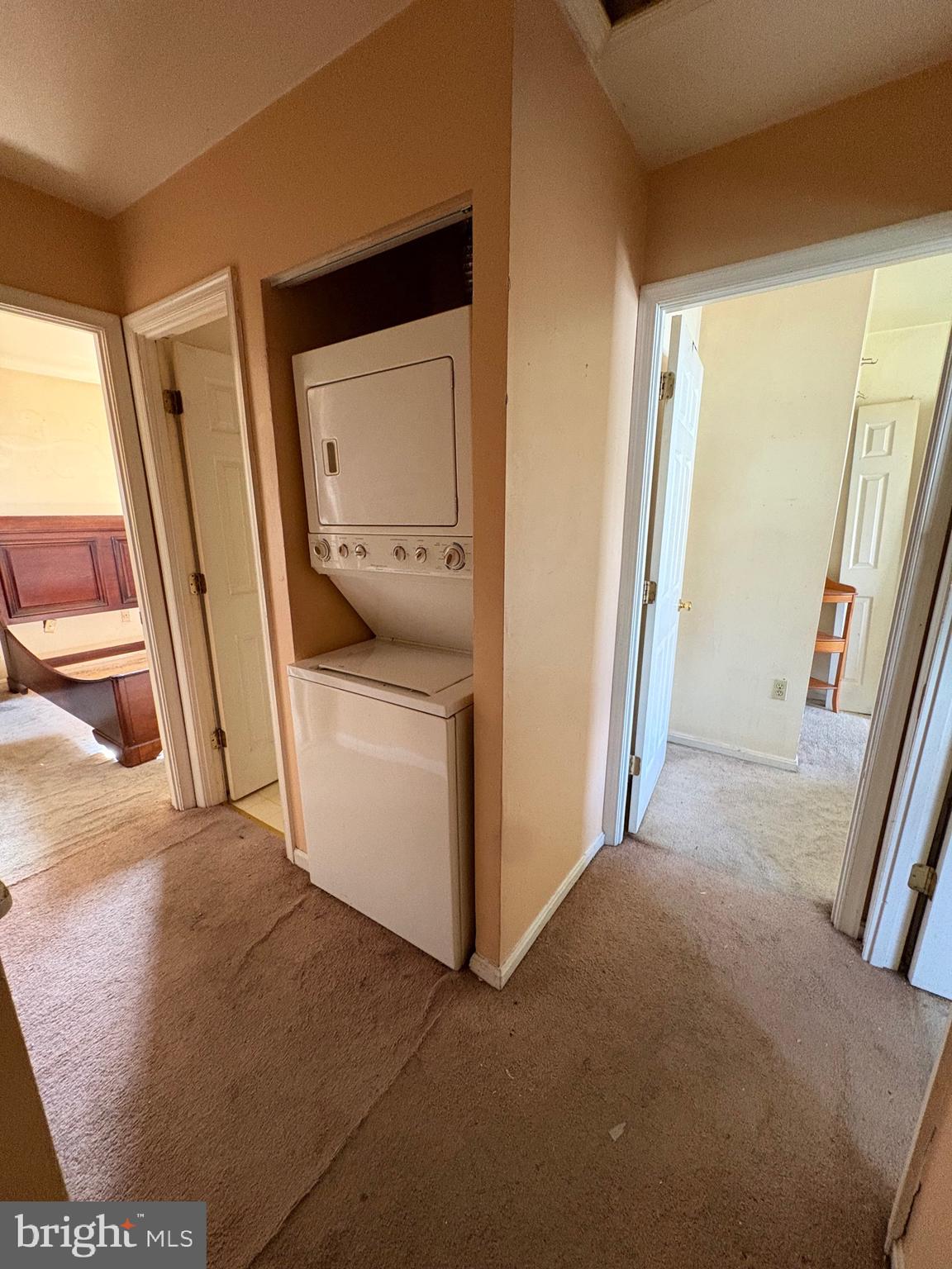 3071 Heath Cote Road Waldorf, MD 20602 - Photo 13 of 21 a view of a hallway with washer and dryer
