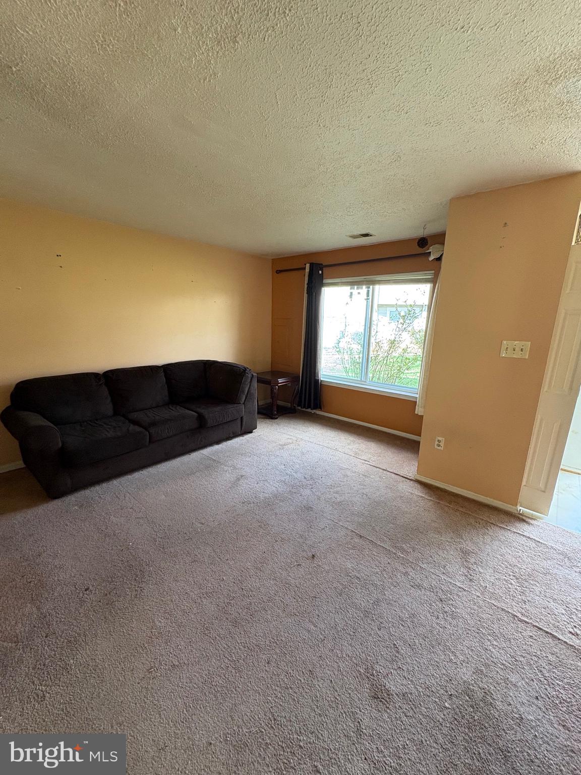 3071 Heath Cote Road Waldorf, MD 20602 - Photo 8 of 21 a view of a big room with wooden floor and windows