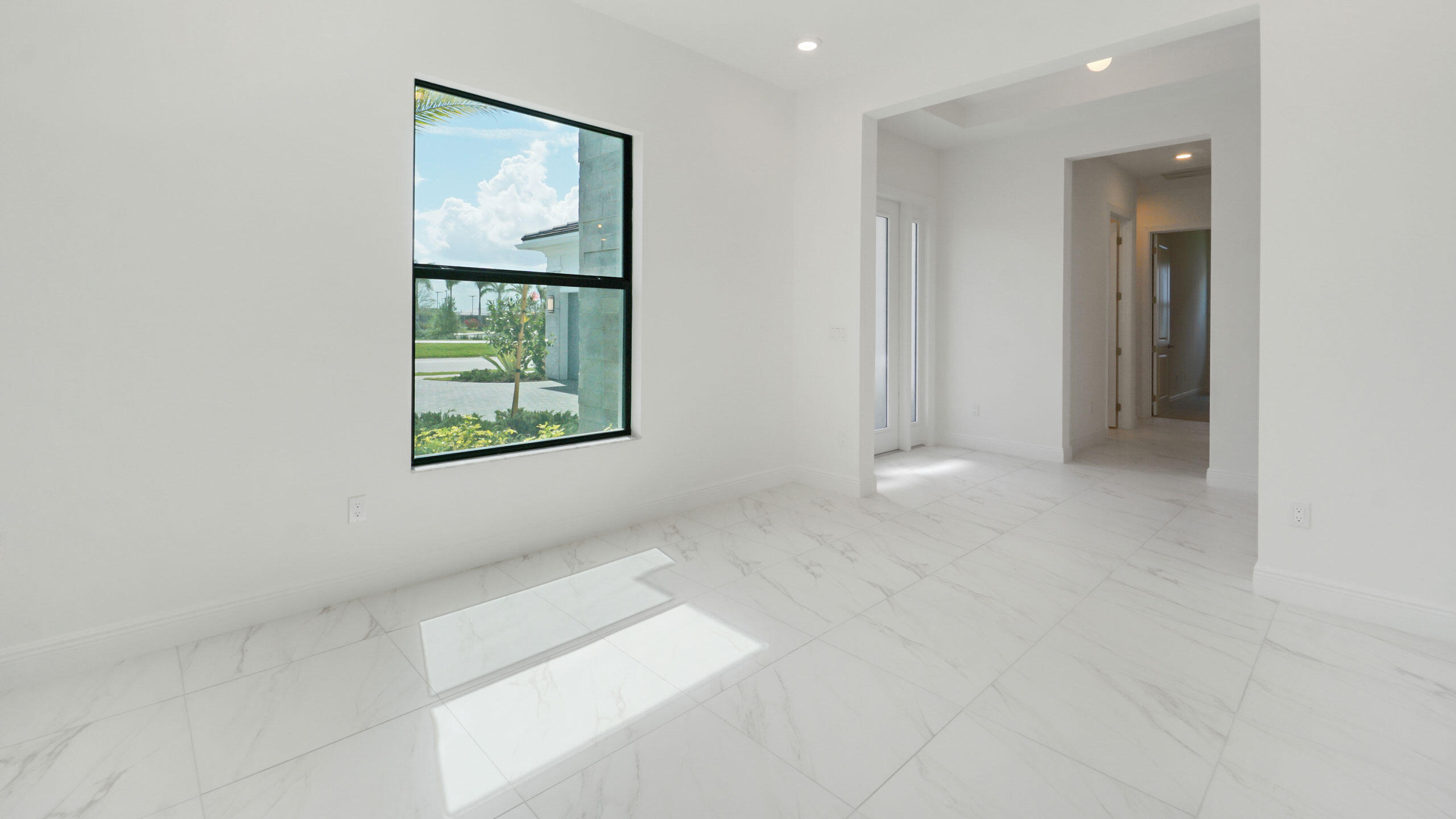 15739 Cresswind Place Westlake, FL 33470 - Photo 15 of 48 an empty room with windows and closet