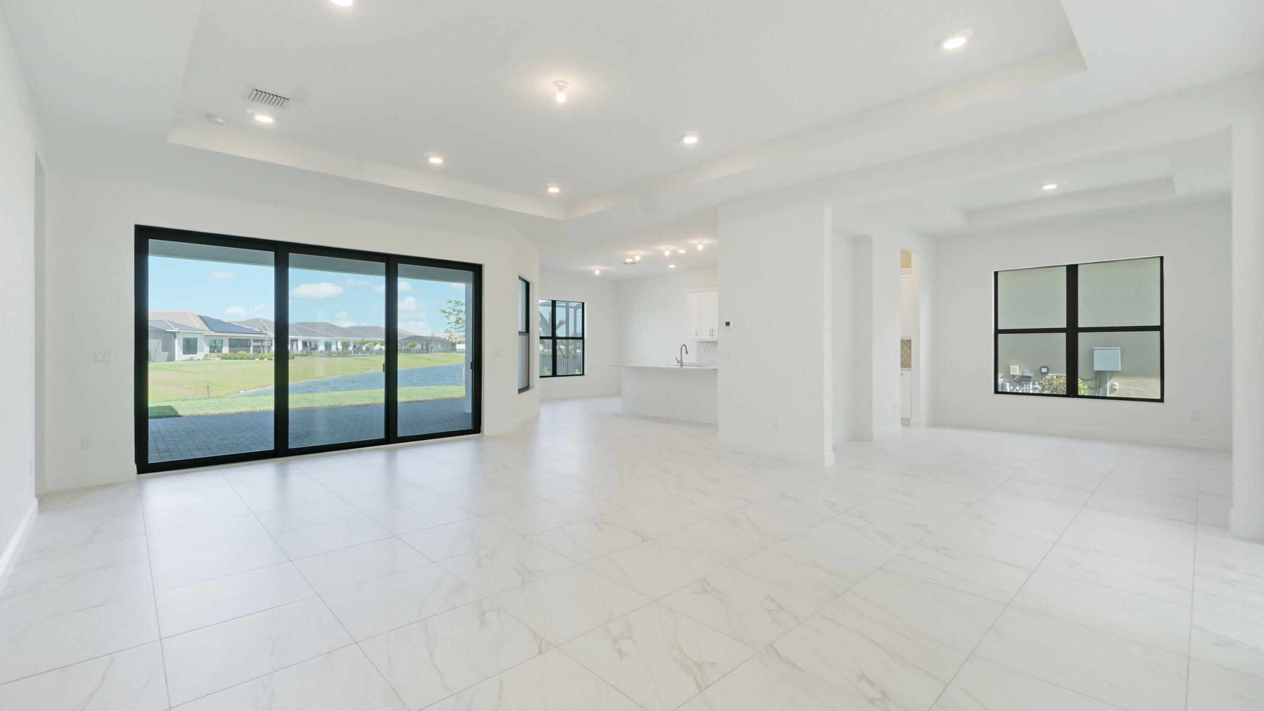 15739 Cresswind Place Westlake, FL 33470 - Photo 22 of 48 a view of an empty room with a window