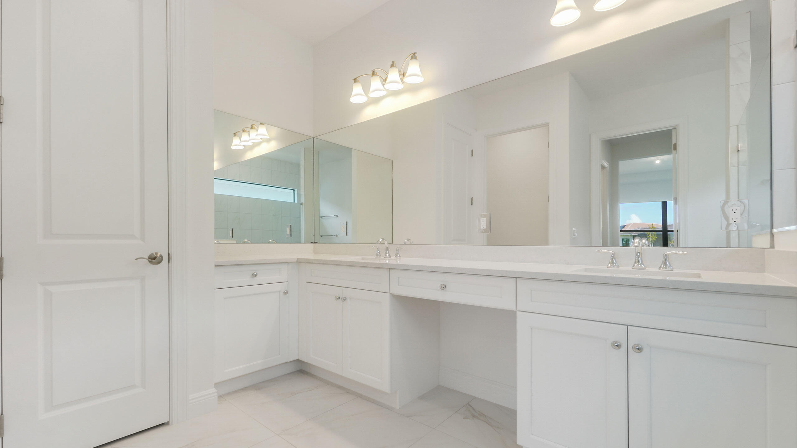 15739 Cresswind Place Westlake, FL 33470 - Photo 27 of 48 a bathroom with a sink and a mirror