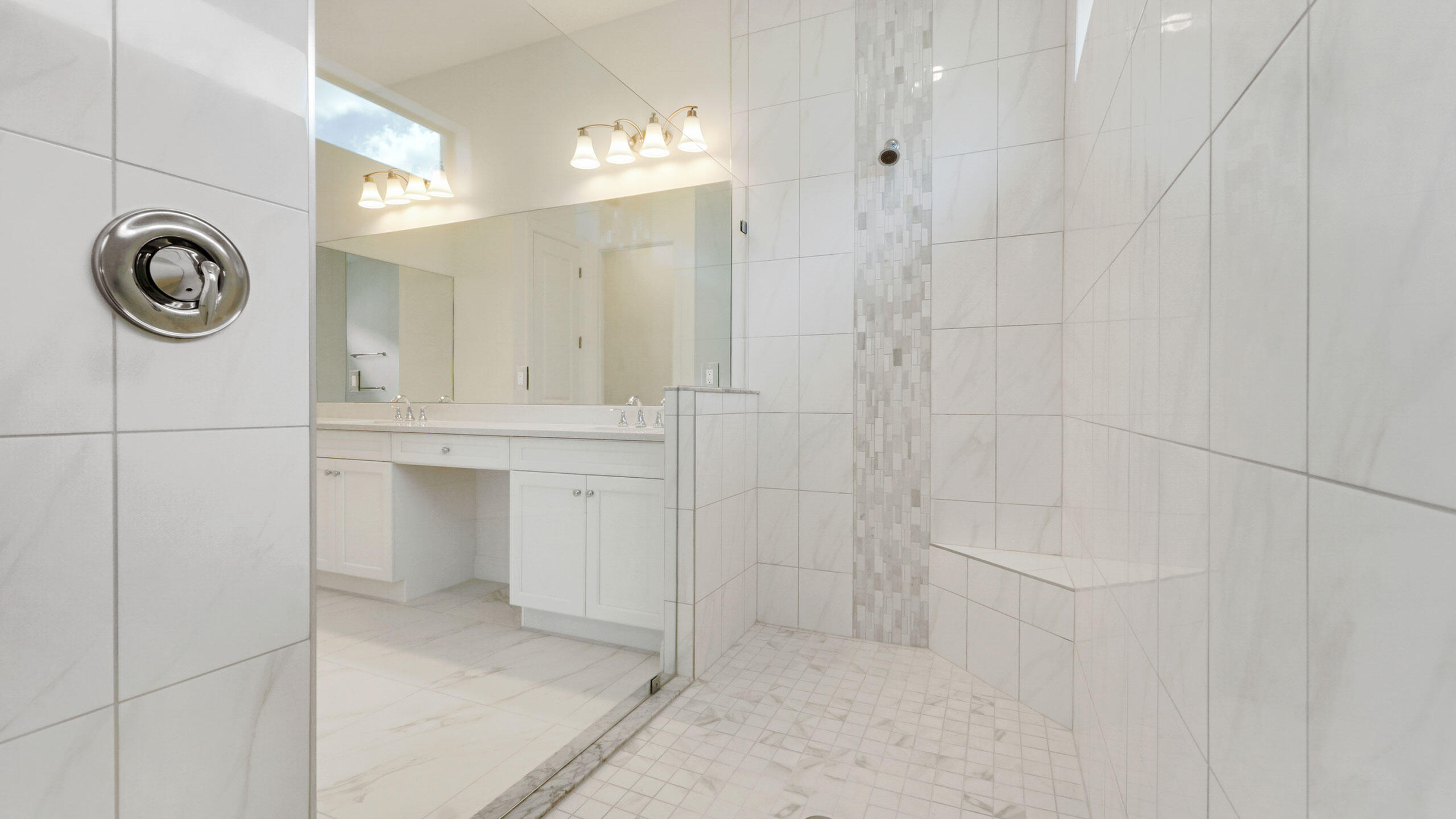 15739 Cresswind Place Westlake, FL 33470 - Photo 29 of 48 a bathroom with a shower and mirror