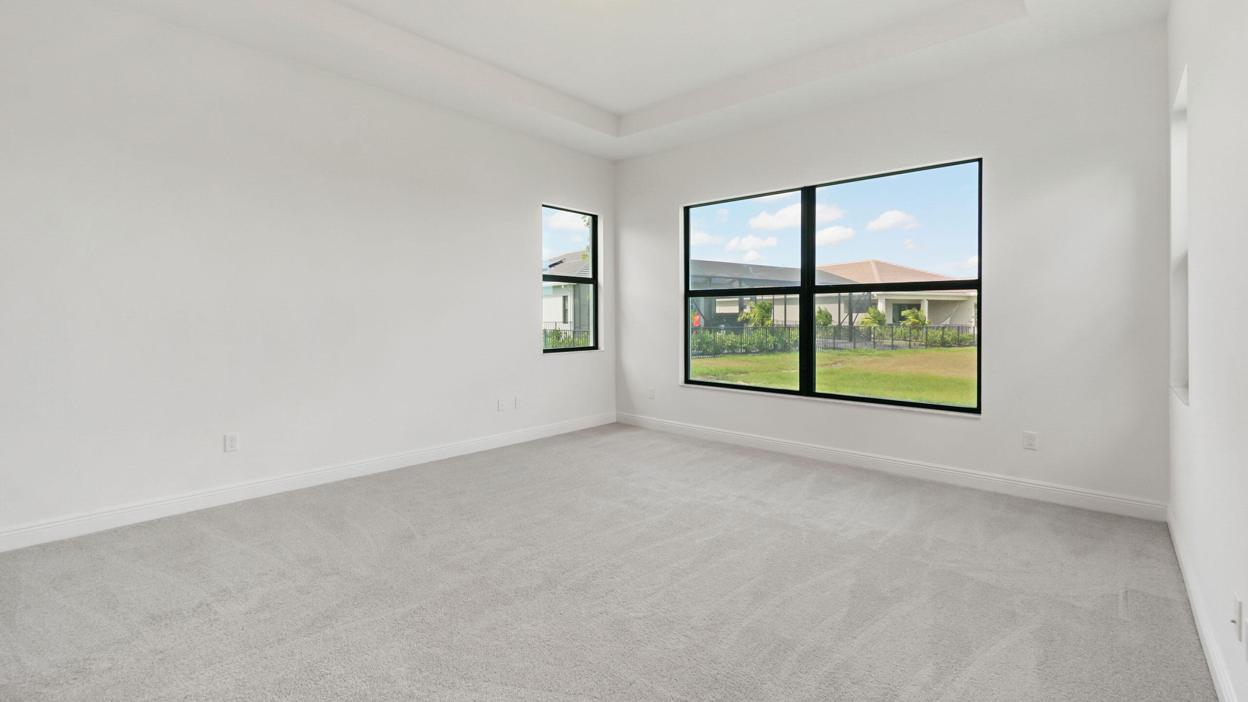 15739 Cresswind Place Westlake, FL 33470 - Photo 31 of 48 an empty room with windows