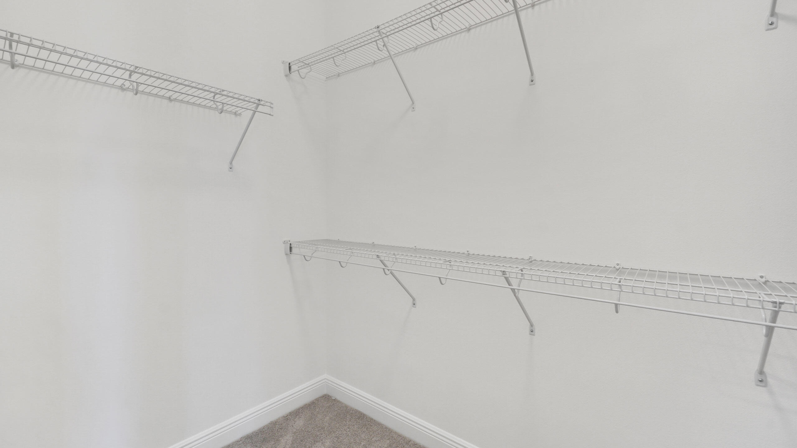 15739 Cresswind Place Westlake, FL 33470 - Photo 34 of 48 a view of a room with racks on the wall